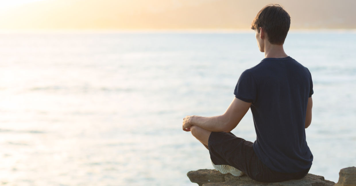 Youth meditating. Youth meditating.