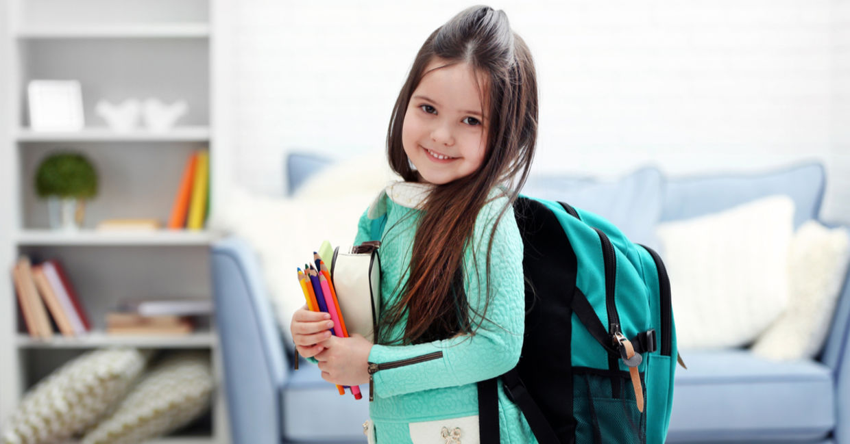 Little girl heading to her first day back at school Little girl heading to her first day back at school