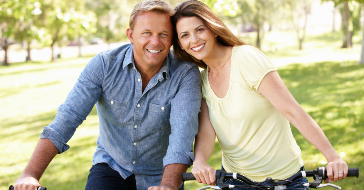 Loving couple riding bikes Loving couple riding bikes