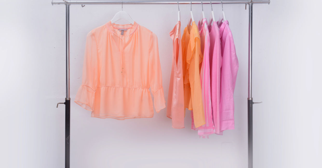 Various vintage clothes on a rail Various vintage clothes on a rail