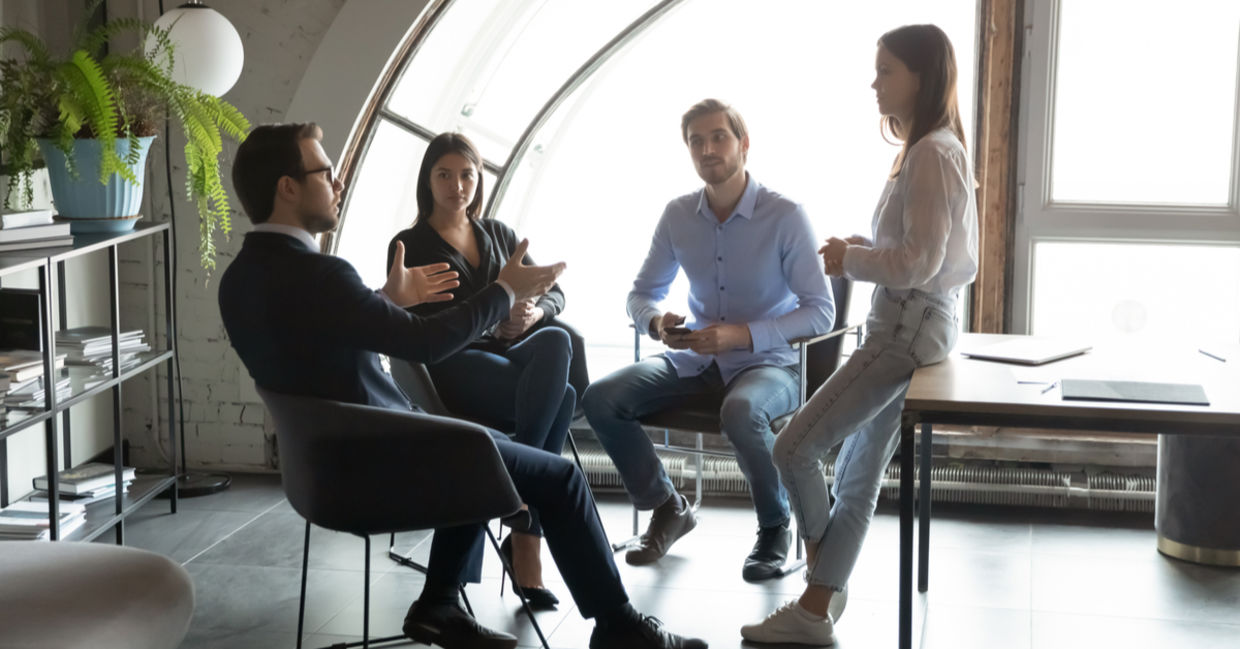 Coworkers actively listening. Coworkers actively listening.