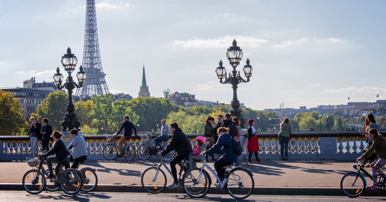 Parisians riding bikes on the annual car-free day. Parisians riding bikes on the annual car-free day.