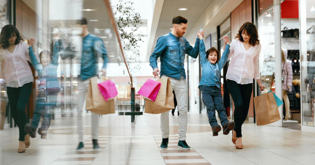 Happy family shopping in mall Happy family shopping in mall