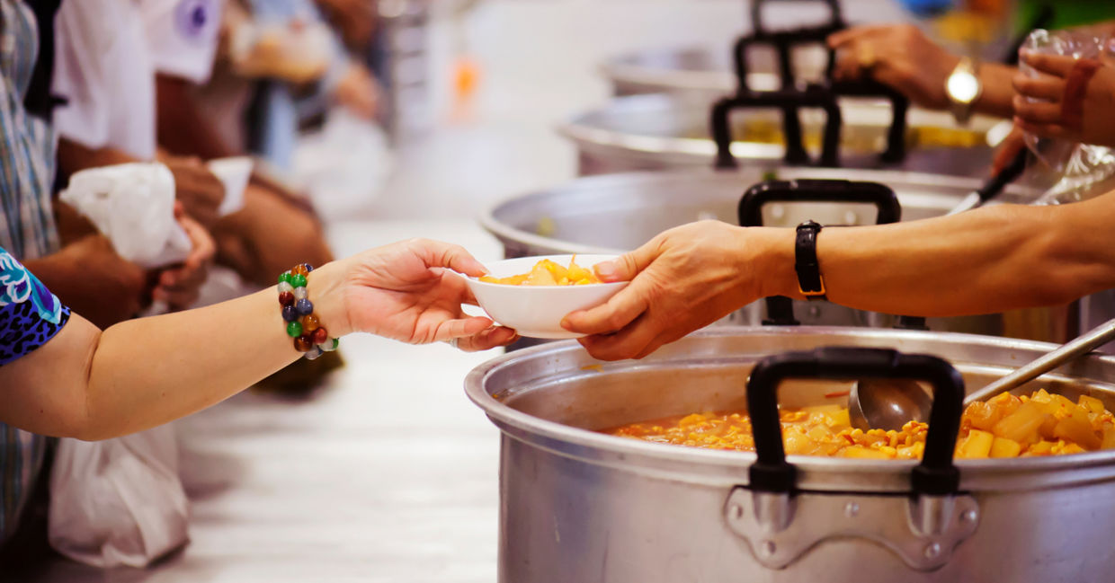Volunteering at a local soup kitchen on Giving Tuesday. Volunteering at a local soup kitchen on Giving Tuesday.