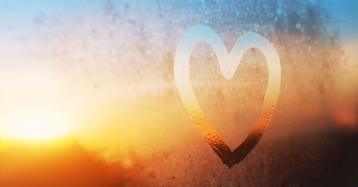Heart painted on a window in winter Heart painted on a window in winter