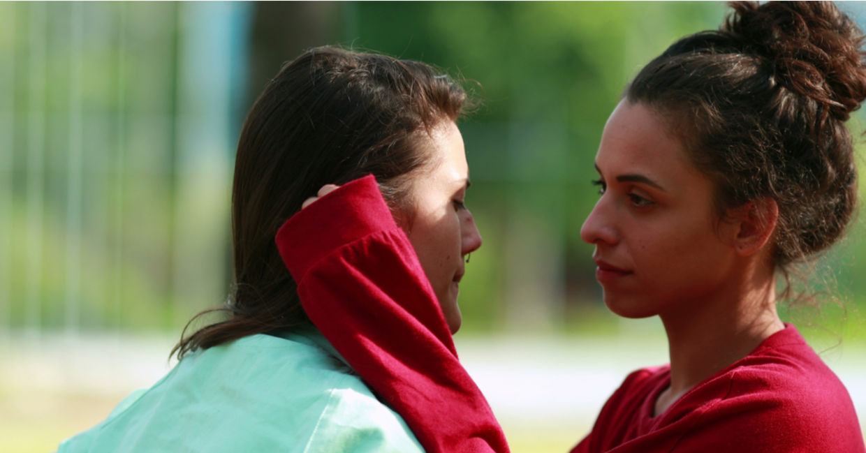 A physical empath holds another person, offering an empathic touch. A physical empath holds another person, offering an empathic touch.