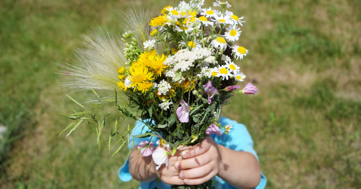 Child with flowers. Child with flowers.