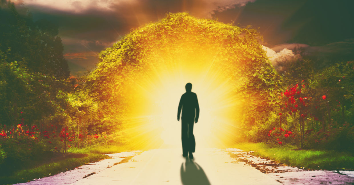 A person walks down a road into light, reflecting the spiritual love a lightworker shines. A person walks down a road into light, reflecting the spiritual love a lightworker shines.