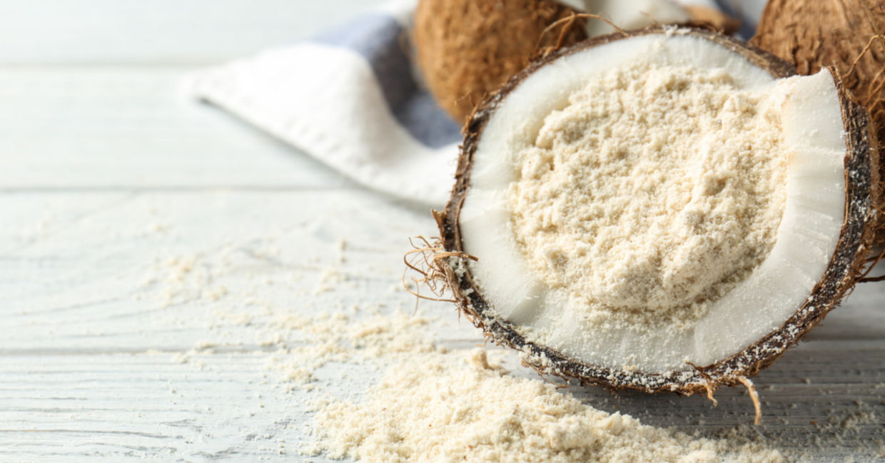 Healthy, gluten-free coconut flour placed in a coconut husk. Healthy, gluten-free coconut flour placed in a coconut husk.
