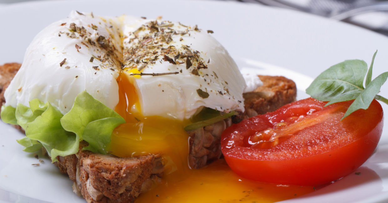 Poached eggs and tomatoes. Poached eggs and tomatoes.