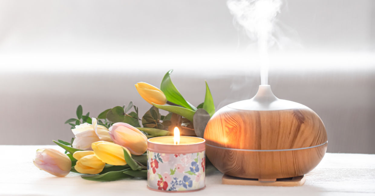 Freshly cut flowers and an aromatic oil diffuser uplift a room. Freshly cut flowers and an aromatic oil diffuser uplift a room.