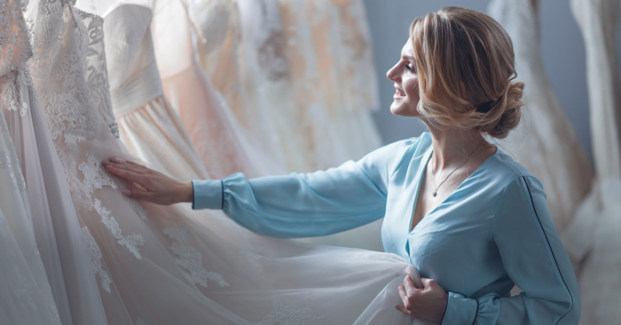 Bride shopping for her wedding gown. Bride shopping for her wedding gown.