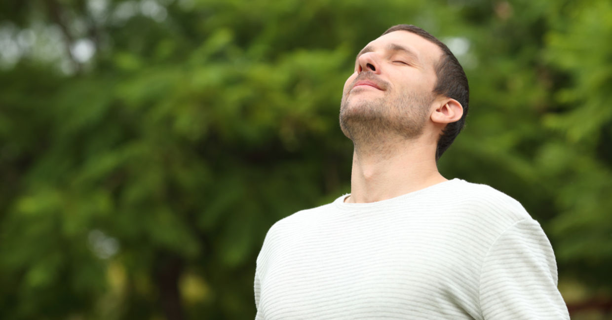 Man doing breathing exercise. Man doing breathing exercise.