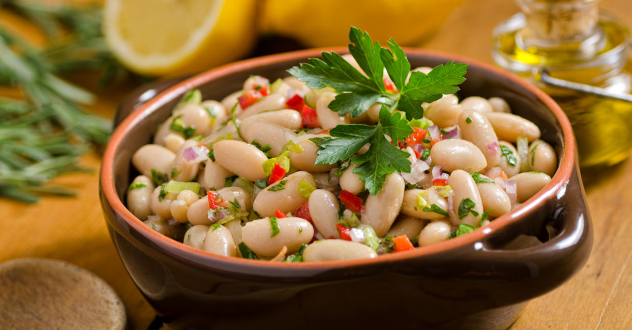 White bean salad with greens and avocado. White bean salad with greens and avocado.