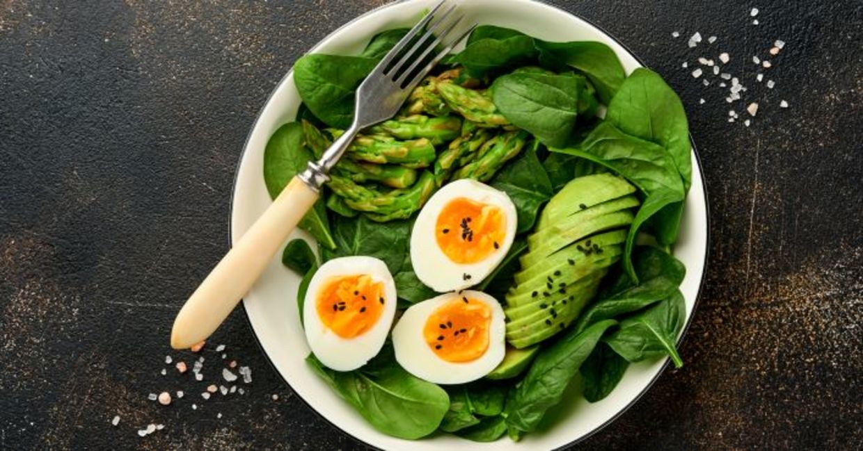 Fresh salad with asparagus, avocado, and spinach. Fresh salad with asparagus, avocado, and spinach.