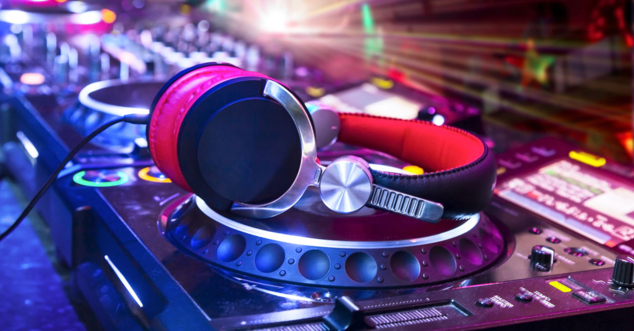 DJ spinning LPs. DJ spinning LPs.