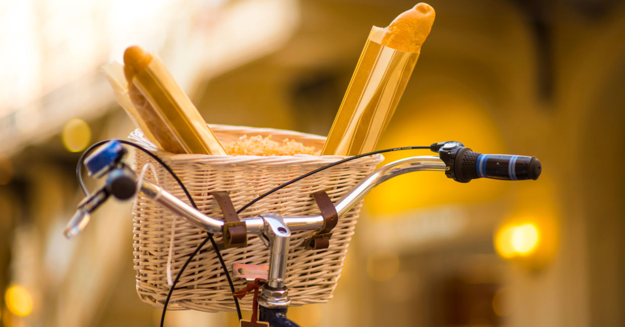 A basket with fresh goods on a bicycle. A basket with fresh goods on a bicycle.