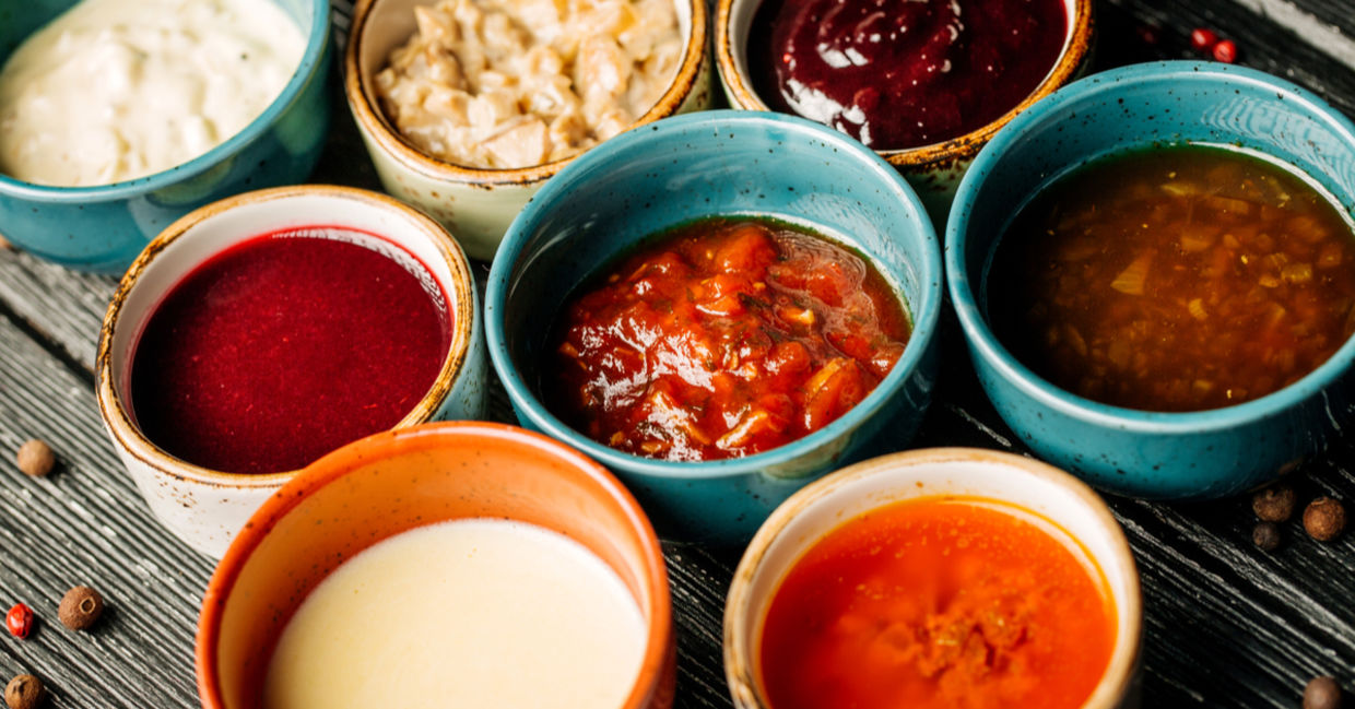 Bowls of various healthy vegan condiments. Bowls of various healthy vegan condiments.