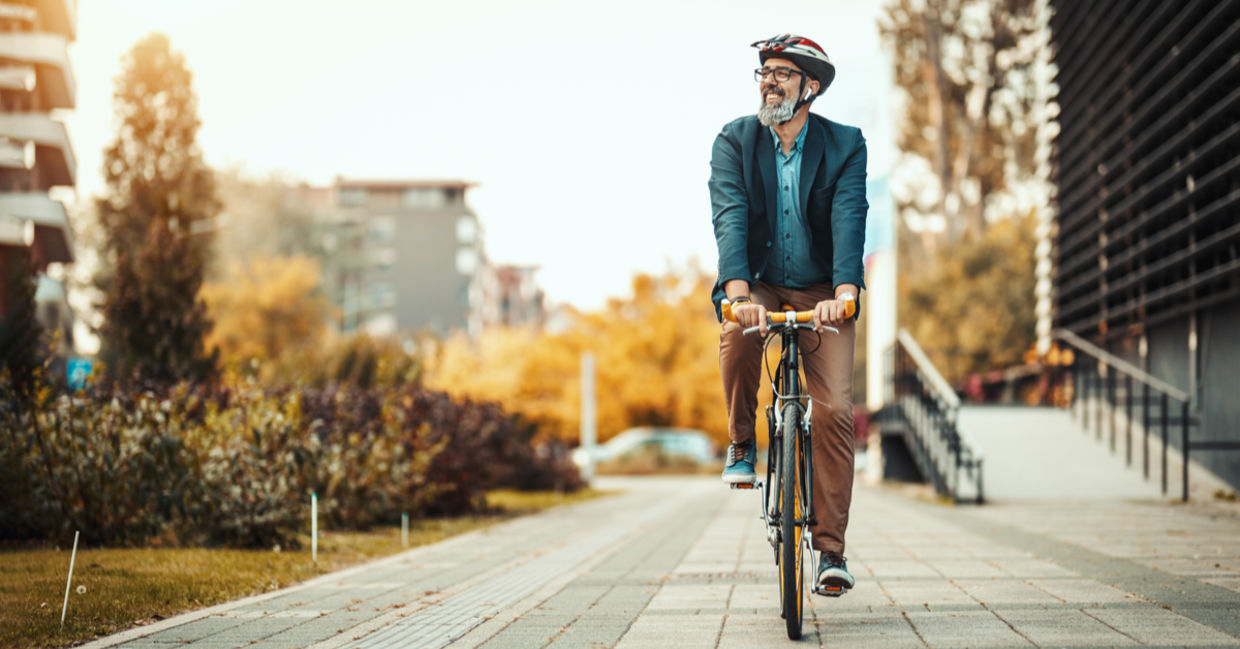 a man on a bicycle.