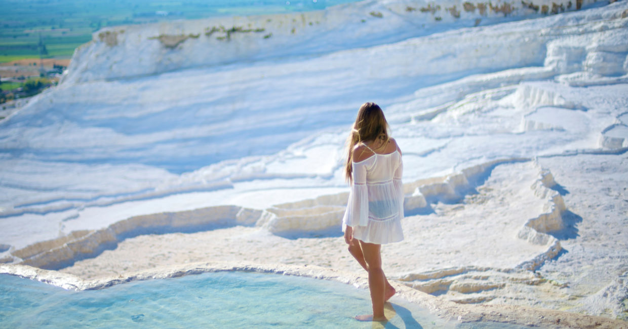 Woman enjoying the hot springs in Pamukkale. Woman enjoying the hot springs in Pamukkale.