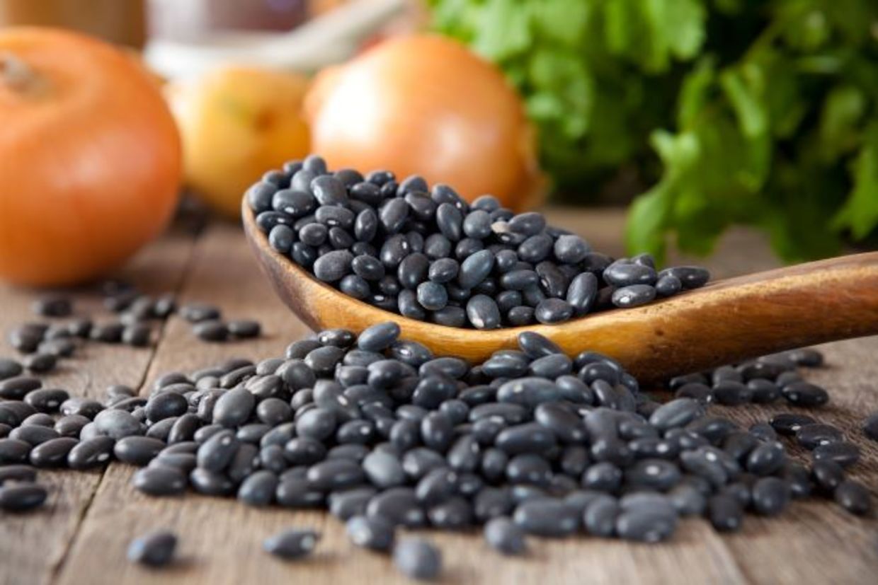 Black beans spread on a table Black beans spread on a table