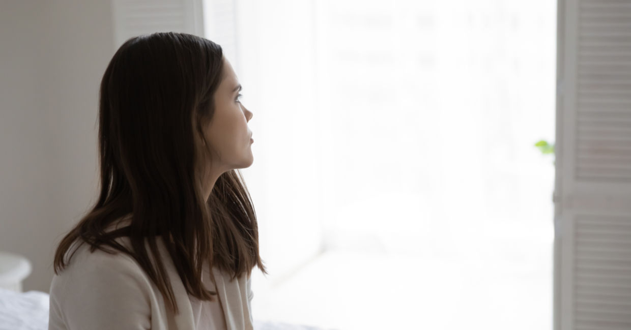 Thoughtful millennial woman thinking about her anxiety. Thoughtful millennial woman thinking about her anxiety.