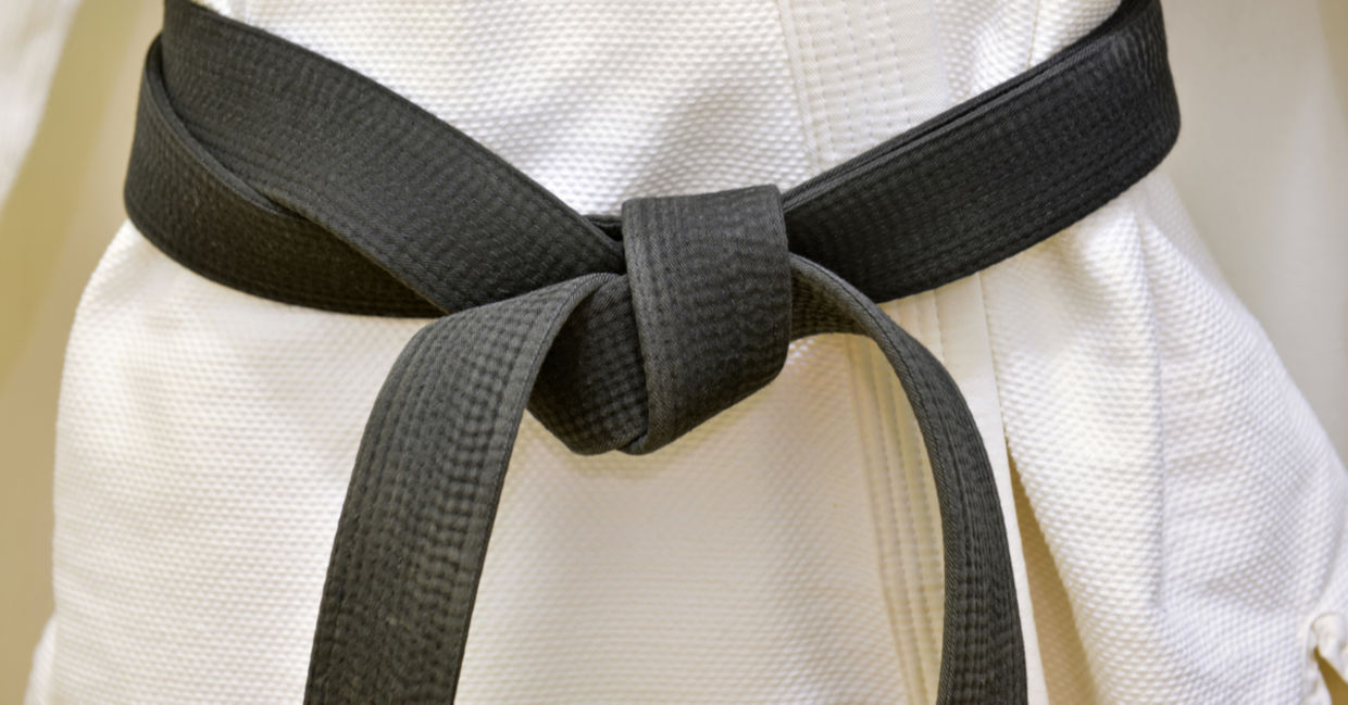 A karate black belt can be earned through excellence. A karate black belt can be earned through excellence.
