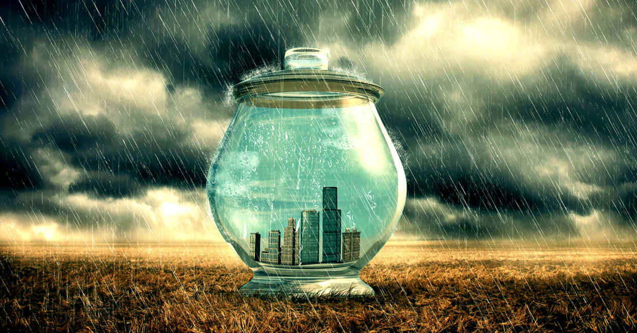 City buildings in a glass jar to emphasize protection from heavy rain. City buildings in a glass jar to emphasize protection from heavy rain.