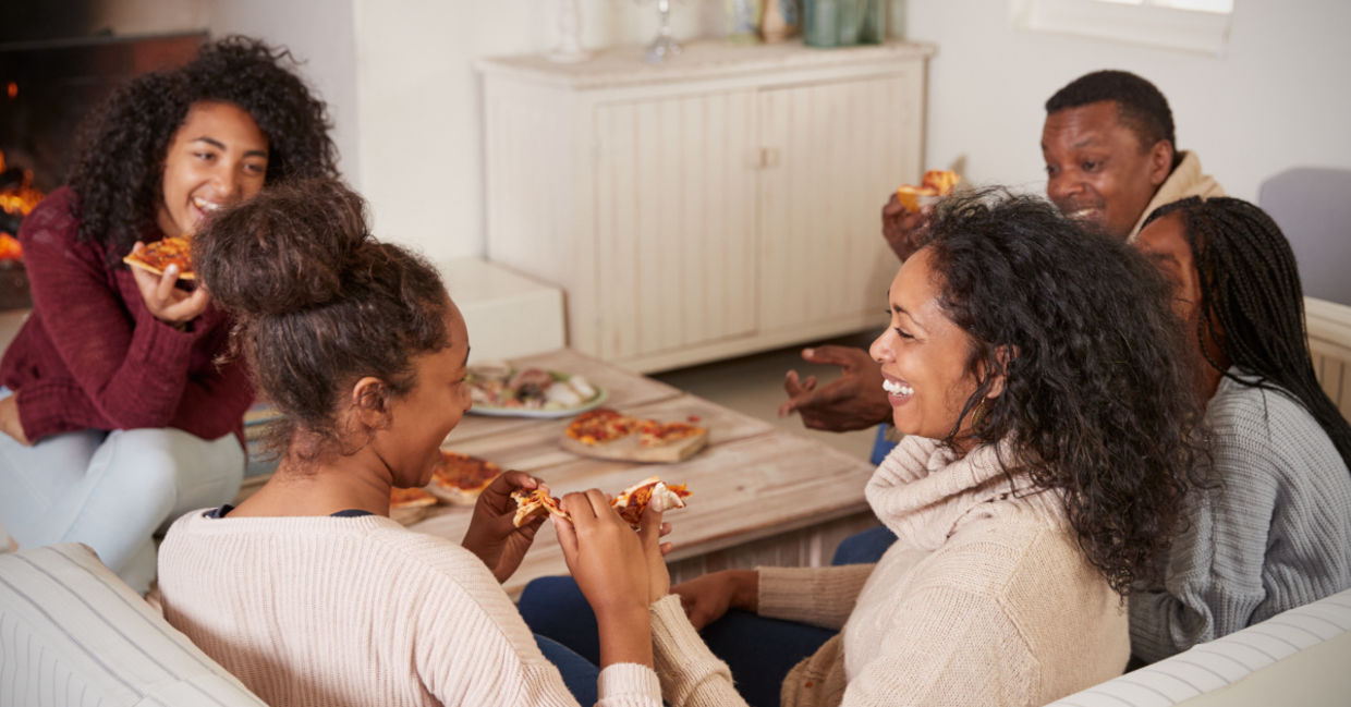 Family pizza night can help families bond. Family pizza night can help families bond.