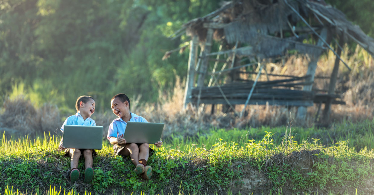 Two boys studying with a laptop. Two boys studying with a laptop.