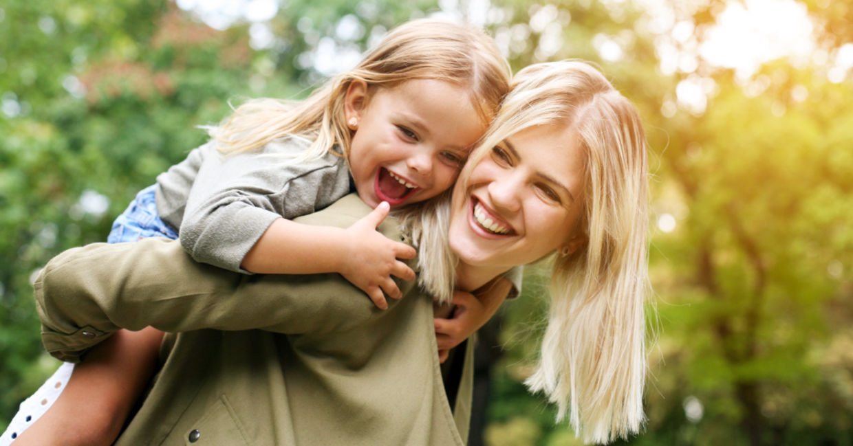 A young girl with her mother. A young girl with her mother.
