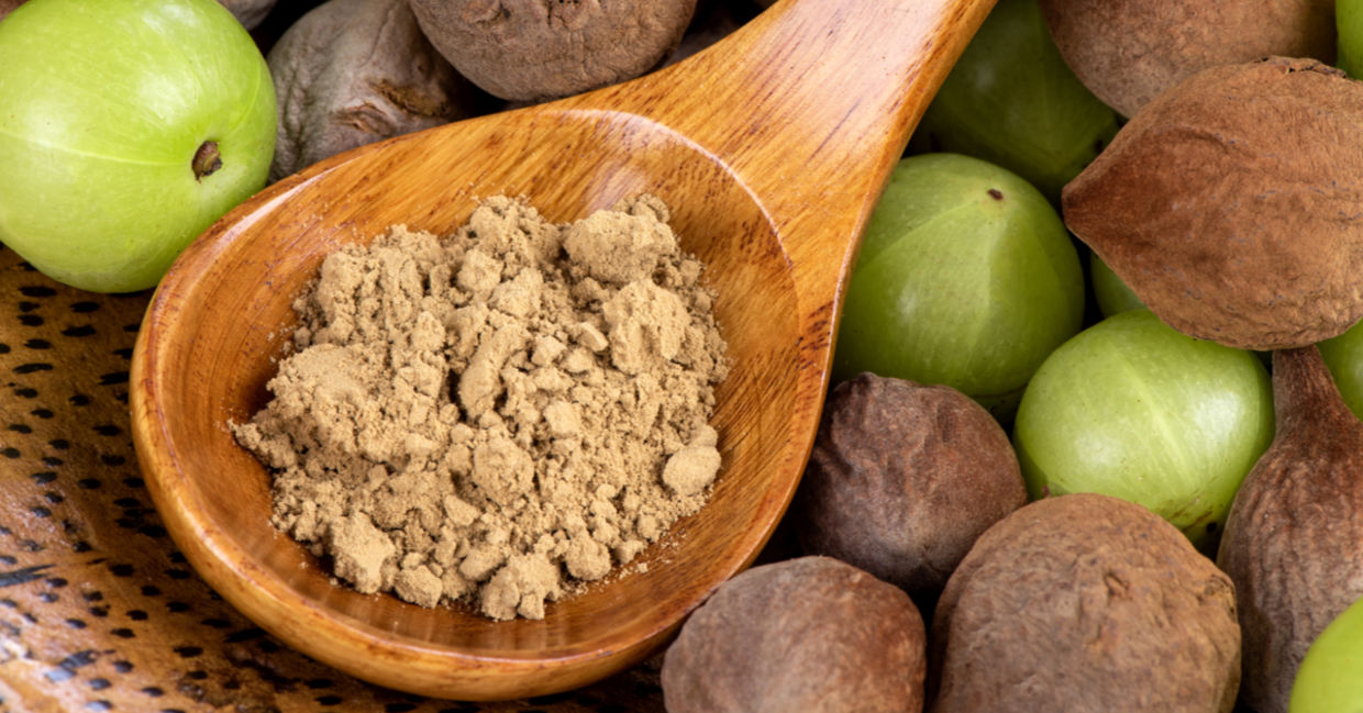 Beleric Myrobalan, Chebulic Myrobalans, Indian Gooseberry fruits and triphala powder. Beleric Myrobalan, Chebulic Myrobalans, Indian Gooseberry fruits and triphala powder.
