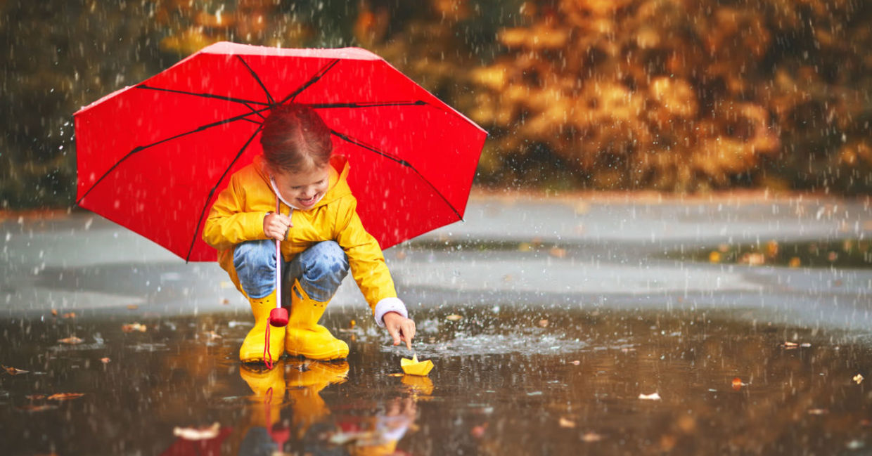 Playing in the puddles during a springtime rain. Playing in the puddles during a springtime rain.