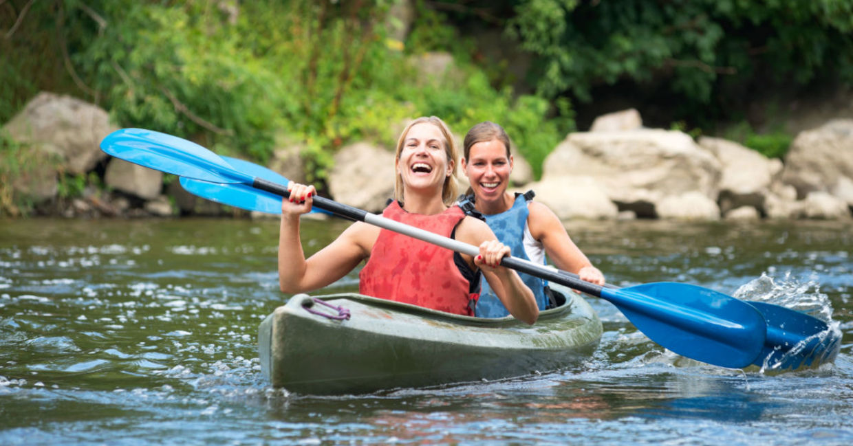 Kayaking on a river. Kayaking on a river.