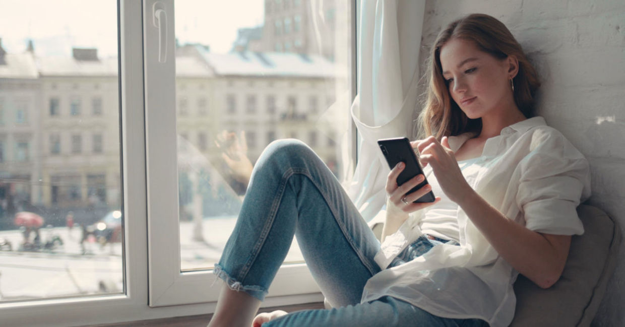 Young woman using a mental health app. Young woman using a mental health app.