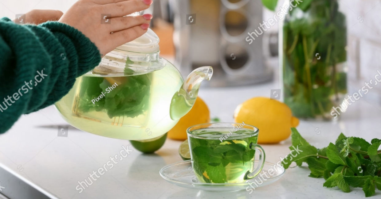 Woman pouring green tea. Woman pouring green tea.