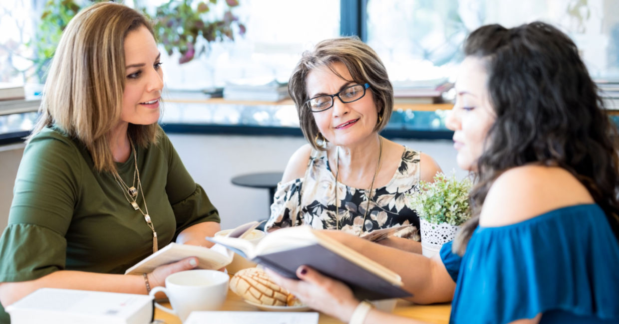 A book club in a local library. A book club in a local library.