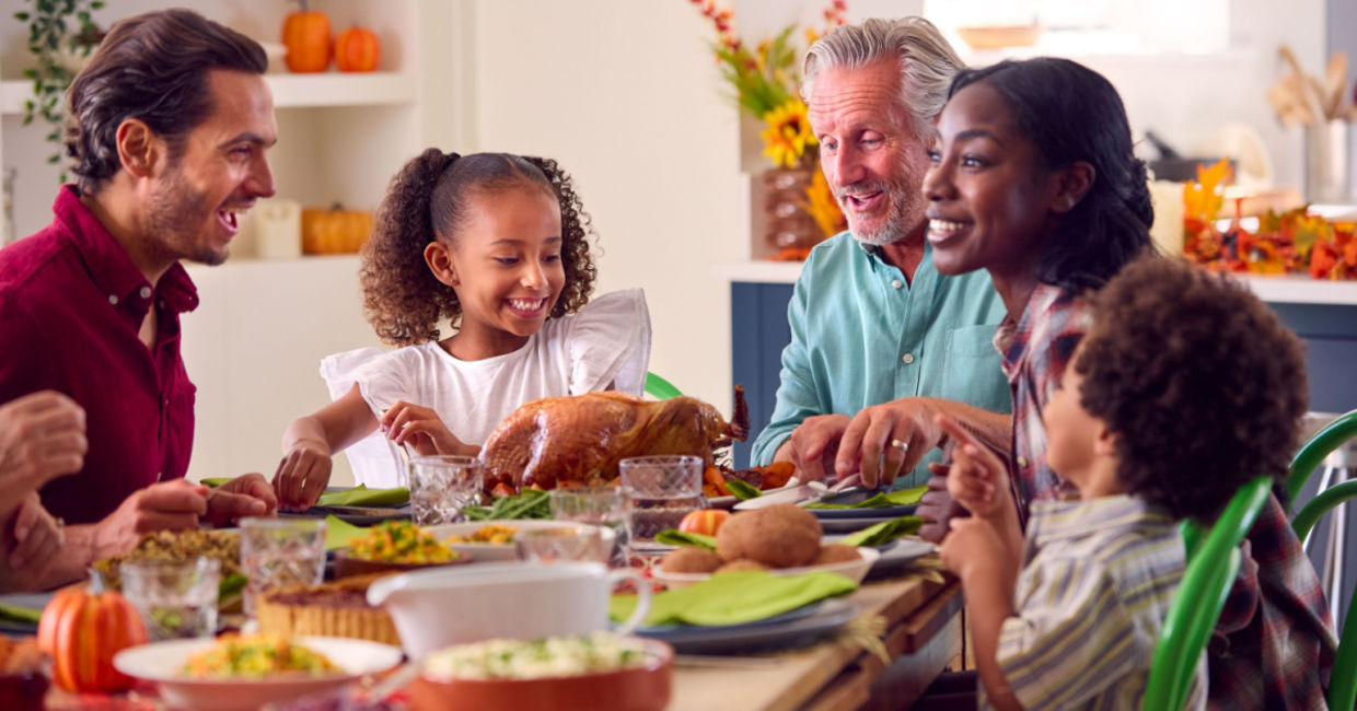 Family sharing a Thanksgiving meal. Family sharing a Thanksgiving meal.