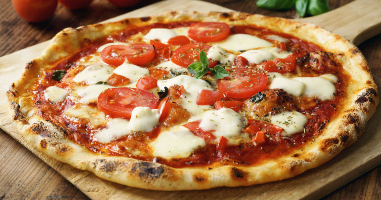 Homemade pizza with fresh mozzarella. Homemade pizza with fresh mozzarella.