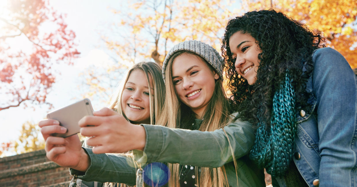 GenZ friends posting on social media. GenZ friends posting on social media.