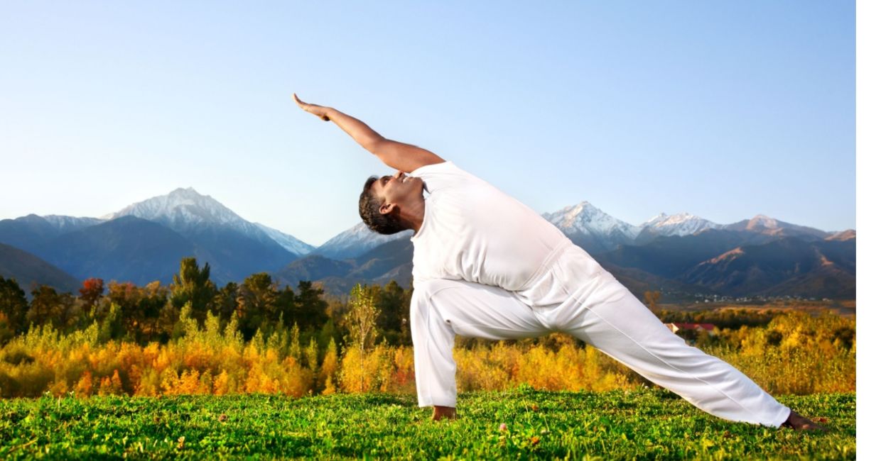 Woman in the triangle yoga pose. Woman in the triangle yoga pose.