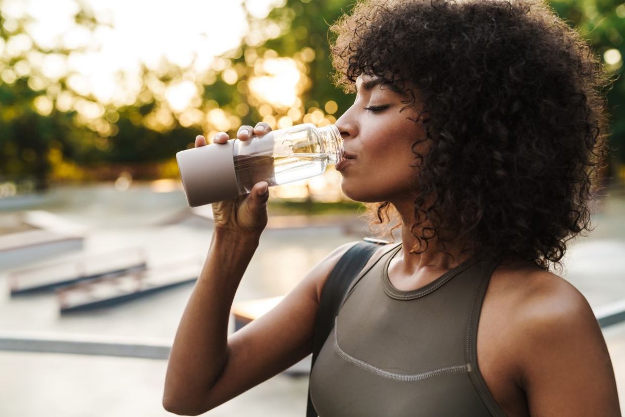 Drinking water will keep you hydrated when you are outdoors.