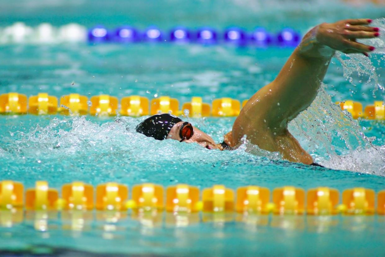 Olympic swimmer competing. Olympic swimmer competing.