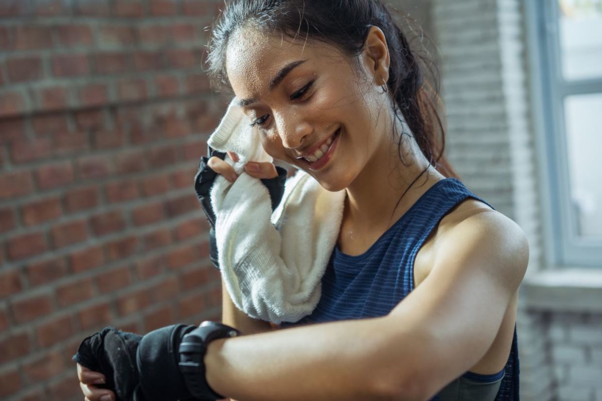 Woman athlete working up a sweat. Woman athlete working up a sweat.