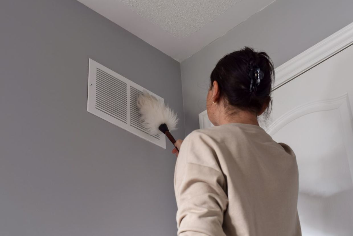 Dusting air vents. Dusting air vents.