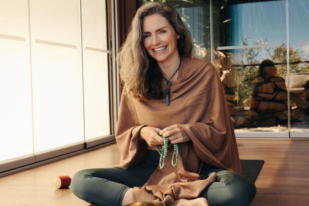Woman practicing a holistic and self-healing lifestyle. Woman practicing a holistic and self-healing lifestyle.