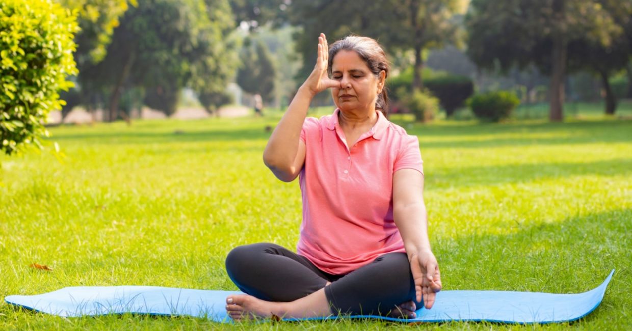 Woman practicing breathing exercises. Woman practicing breathing exercises.