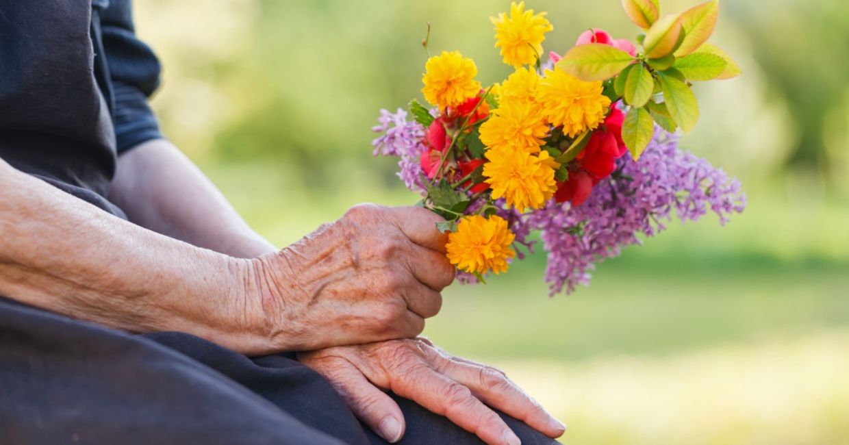 Bringing flowers to a senior neighbor. Bringing flowers to a senior neighbor.
