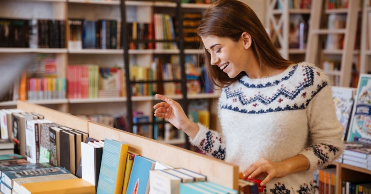 Woman browsing books. Woman browsing books.