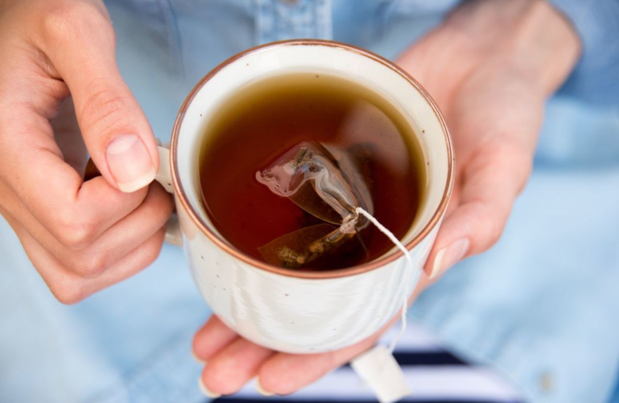 Enjoying a cup of hot tea. Enjoying a cup of hot tea.